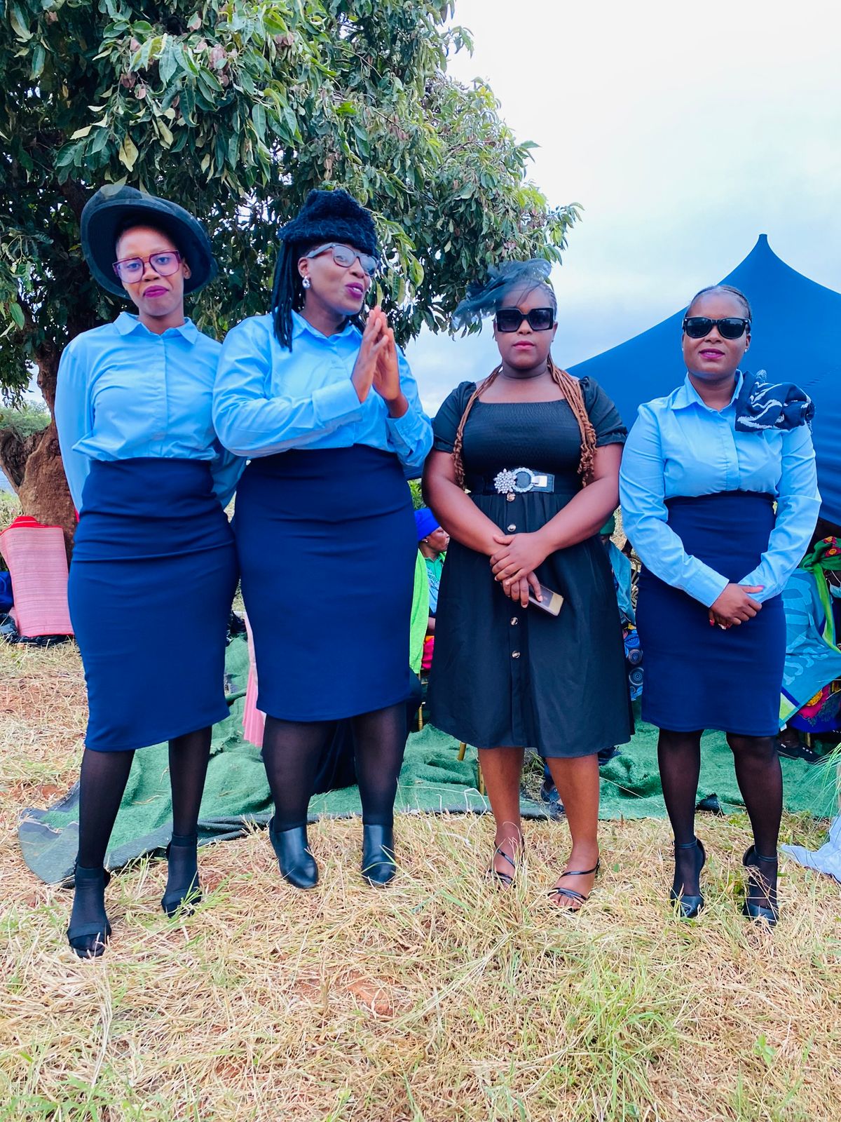 Funeral service team gathered outdoors